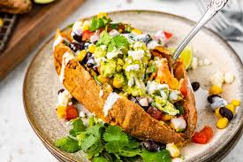 🍠 Stuffed Sweet Potato with Avocado, Black Beans & Cilantro Lime Crema